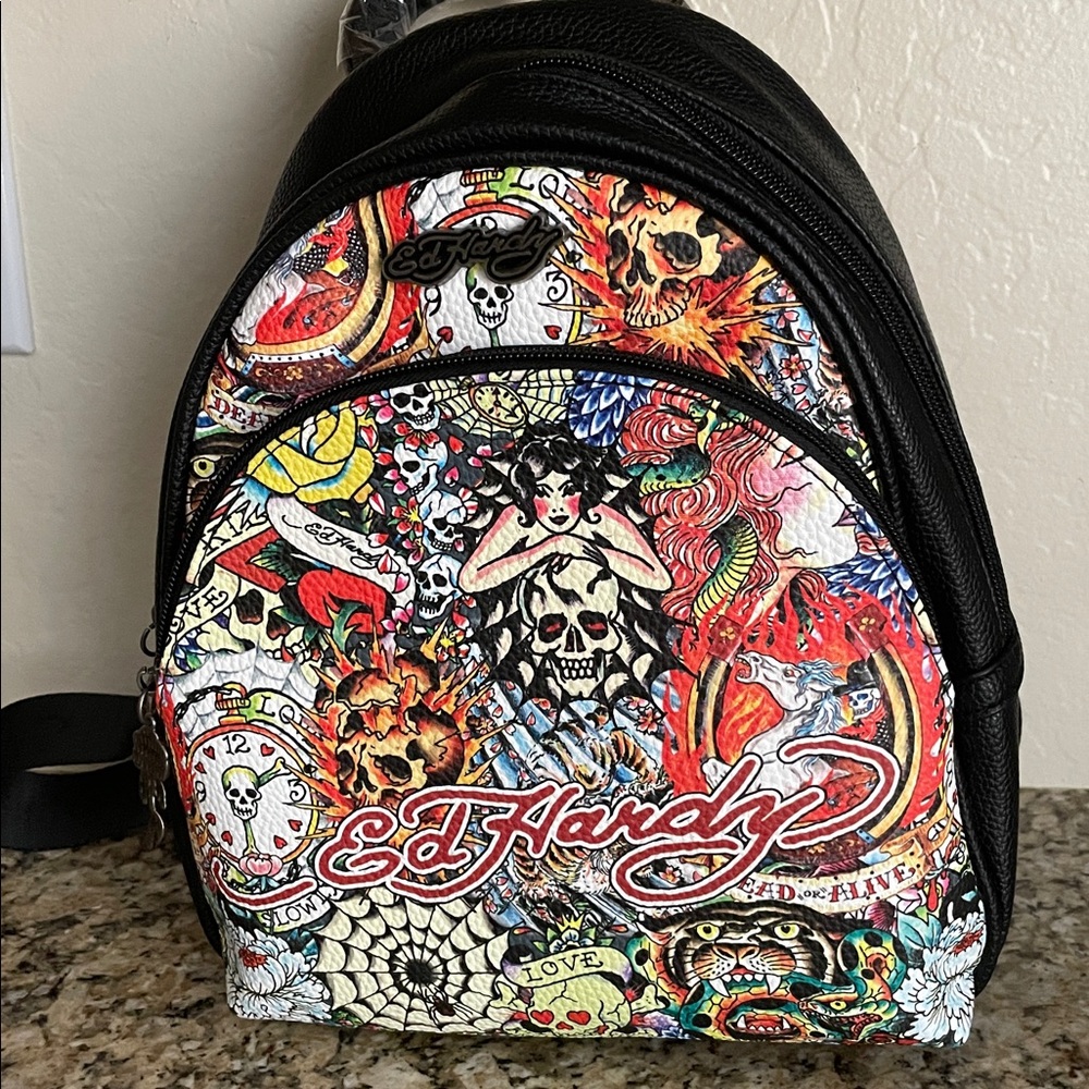 Ed Hardy Multicolor Tattoo Graphic Backpack. Many iconic images and details.